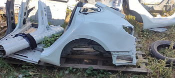 Четверть задняя левая (белая поврежденная) TESLA MODEL 3 1073677-S0-A
