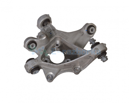 Кулак поворотный задний левый  TESLA MODEL 3